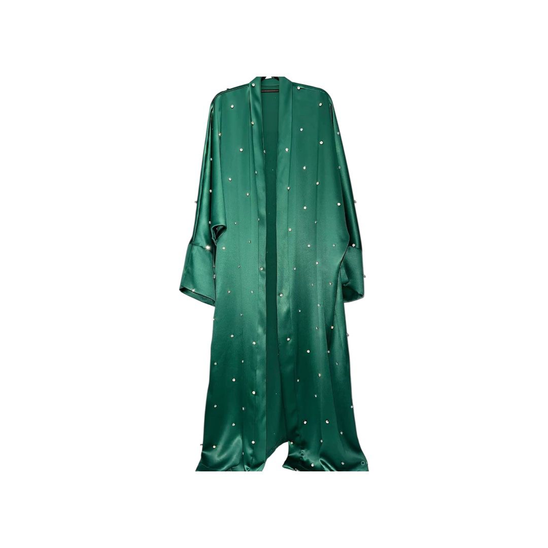 Emerald Starlight Abaya from the Noor Al Layl Collection.